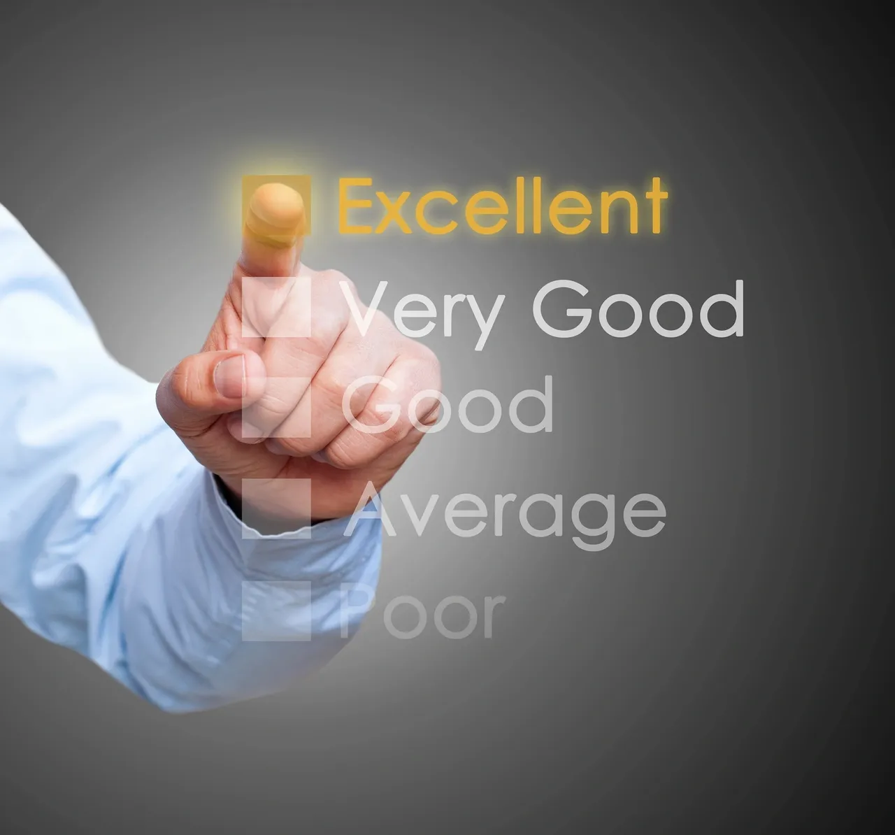 A person is touching an excellent word on the screen.