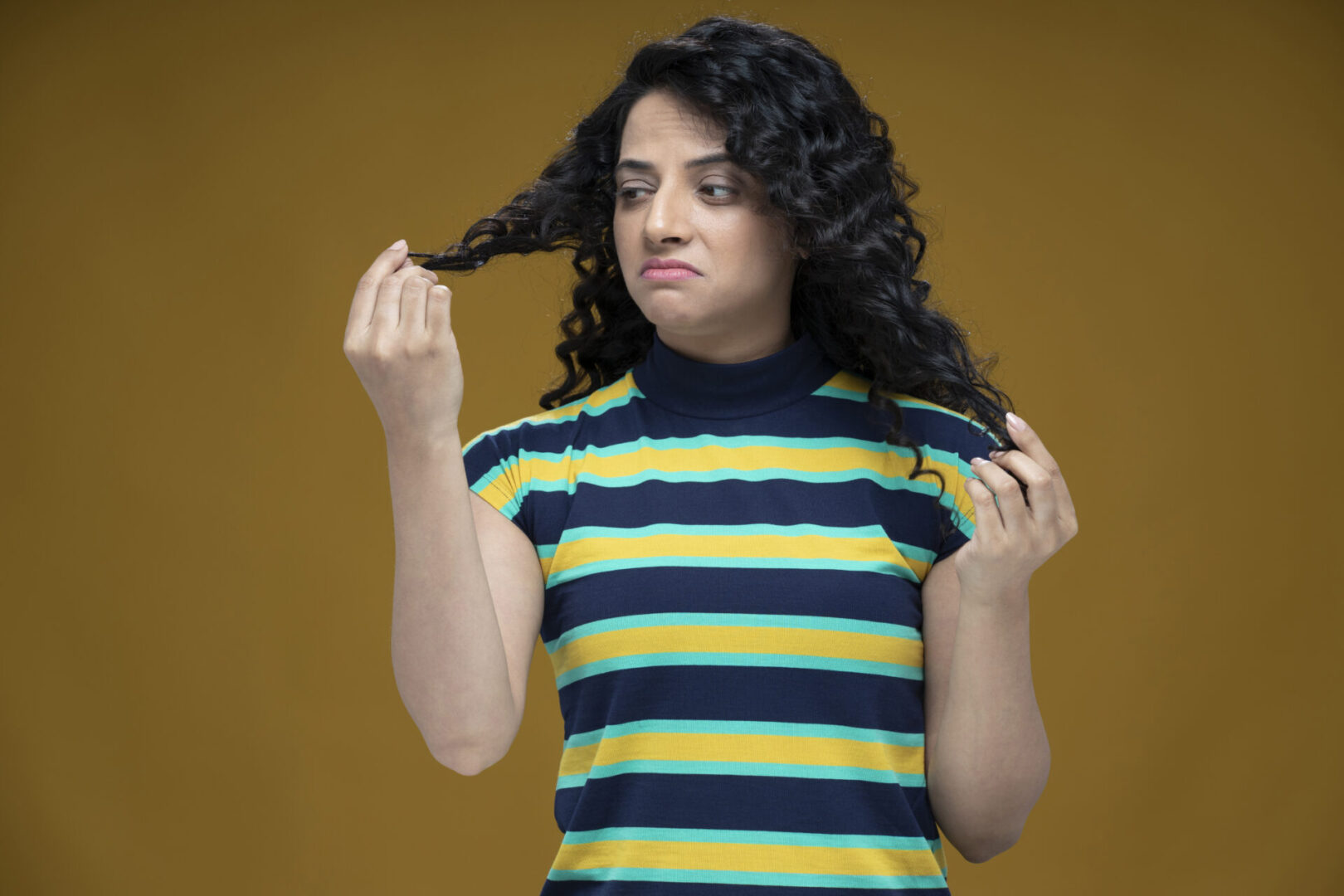 shot of a young women standing isolated over purple background:- stock photo Calm Kids: Anxiety Skills Center